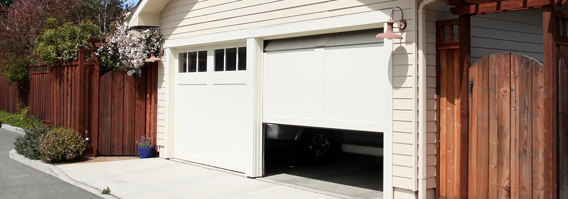 Fix Metal Garage Door Jerking in Port Orange